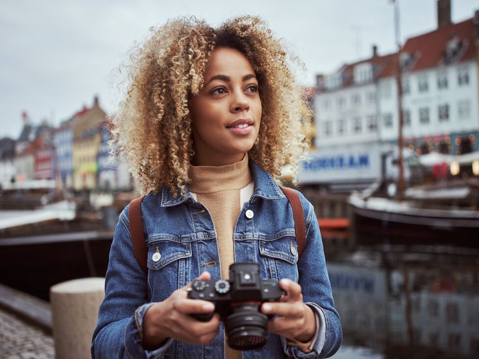 woman in Amsterdam with camera